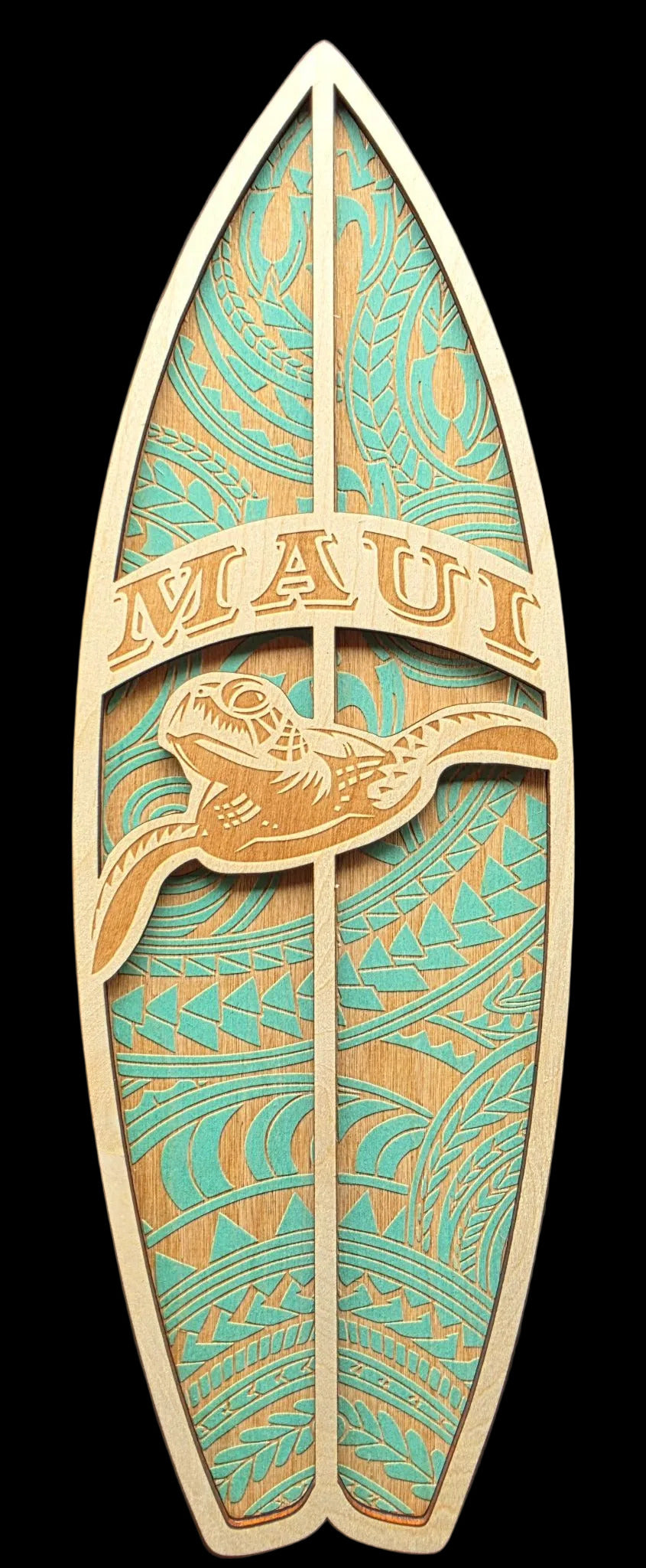 Decorative surfboard-shaped sign with turtle design and 'Maui' text on a black background