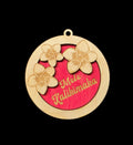 Decorative wooden ornament with floral design and 'Mele Kalikimaka' text on a black background