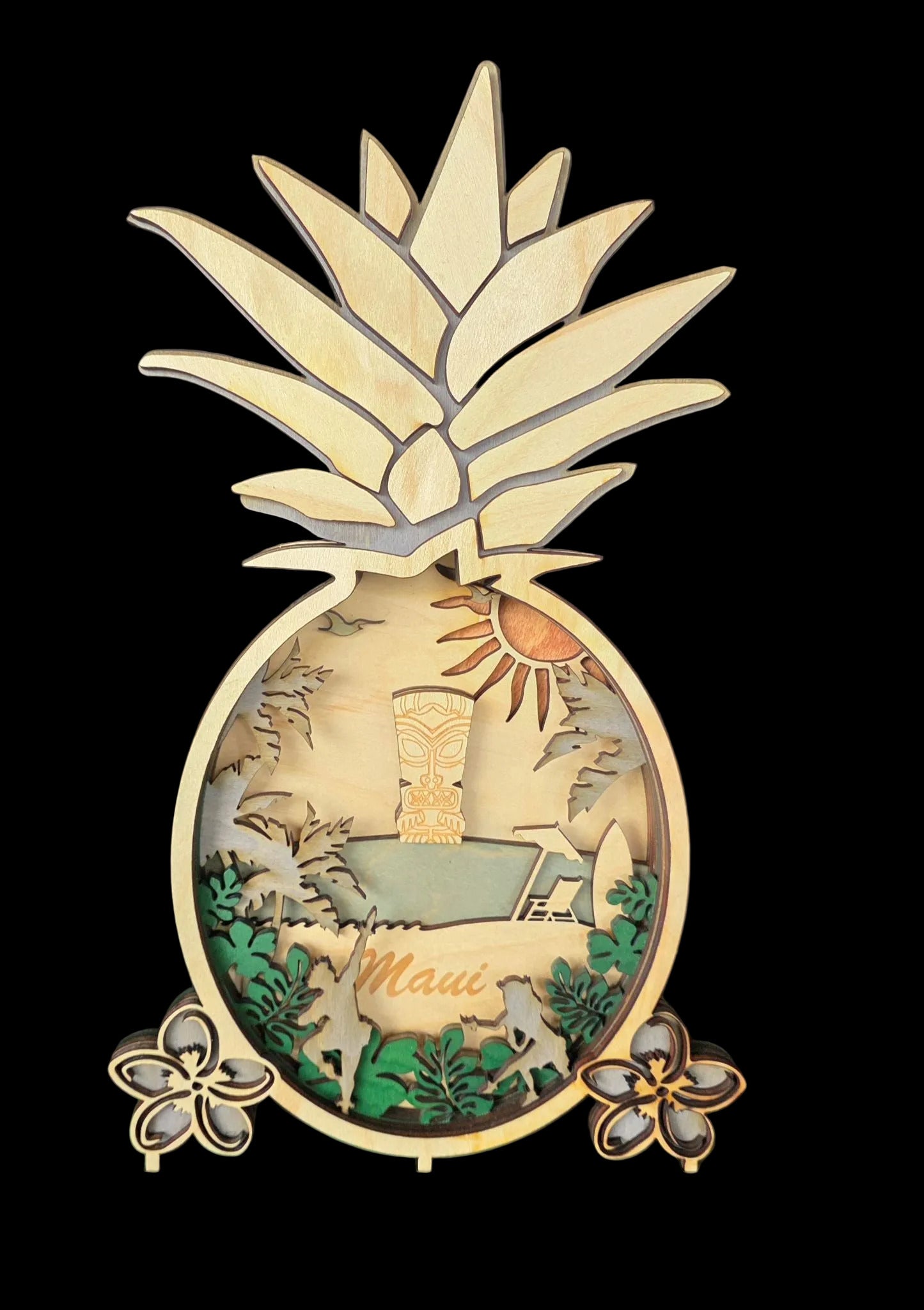 Decorative pineapple-shaped display with Hawaiian-themed elements on a dark background