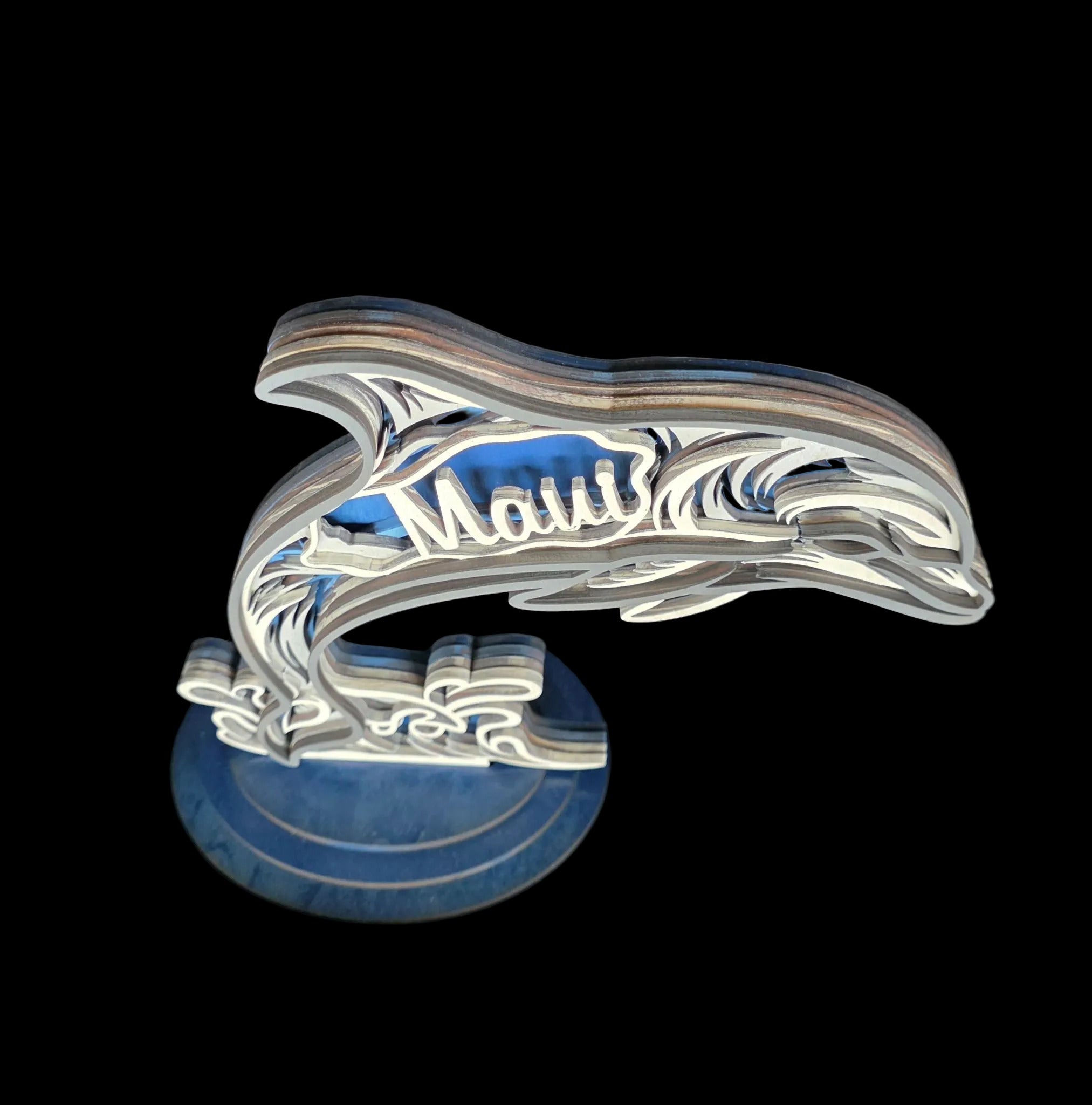 Decorative emblem with 'Mallory' text on a dark fabric background