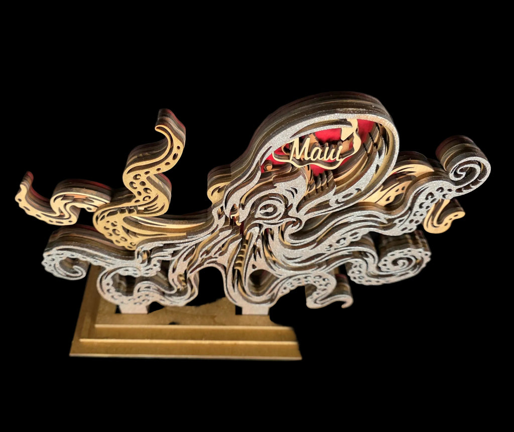 Decorative wooden sculpture with intricate designs on a black background