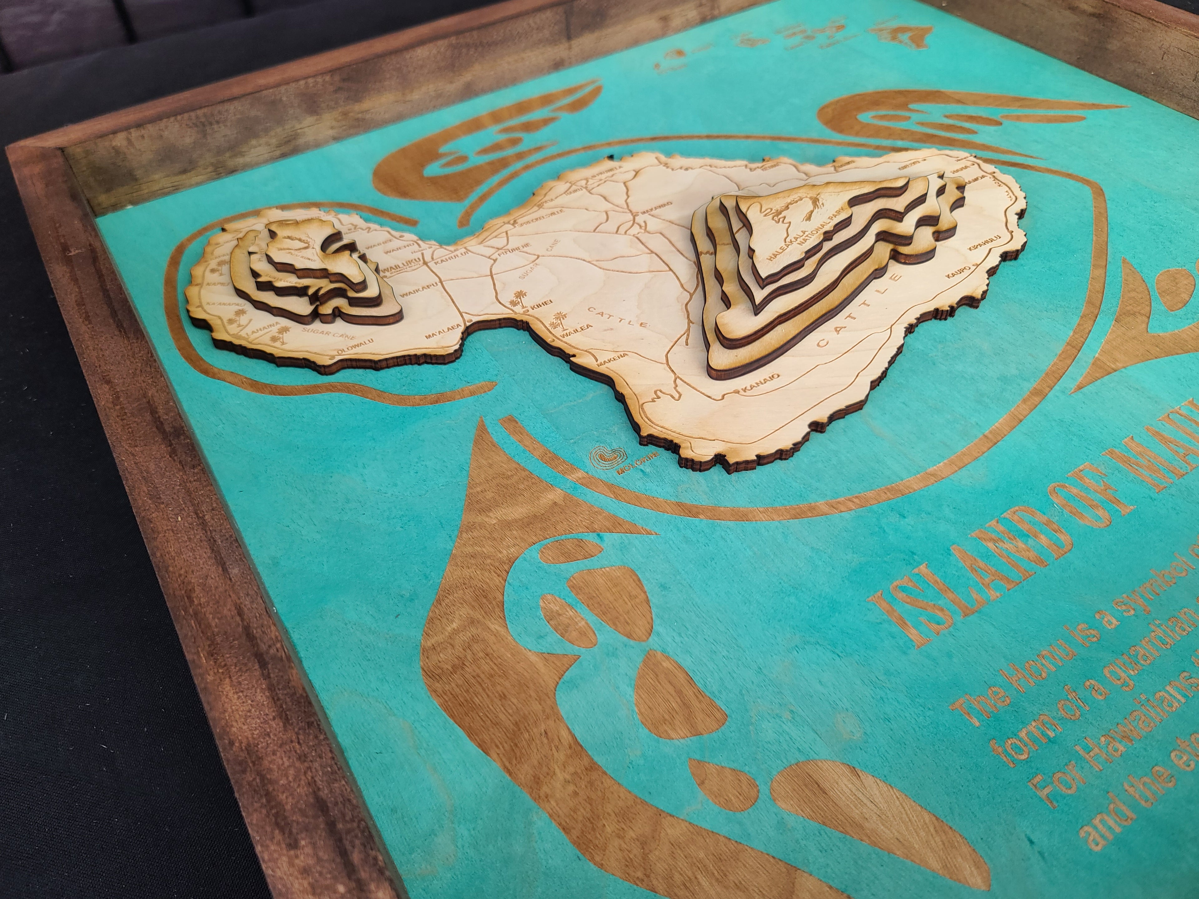 Wooden map of a island on a turquoise background with decorative elements