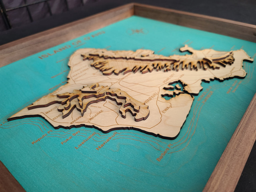 Wooden map of a region on a teal background